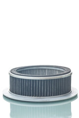 Automotive Concepts. Closeup View of Used Dirty Vehicle Engine Round Air Filter Isolated Over White Background