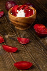 yogurt made from milk and red ripe plum