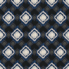 Seamless Ikat ethnic pattern. Abstract textured background