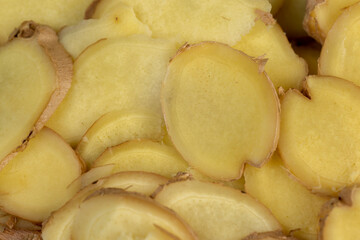 details of the ginger root used in cooking sliced into pieces