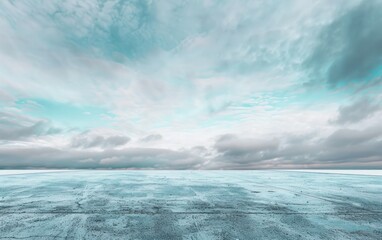Fototapeta premium Frozen landscape under a cloudy sky with expansive horizon. Winter and cold weather concept for outdoor scenery.