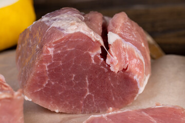 a cut piece of pork fillet on a cutting board