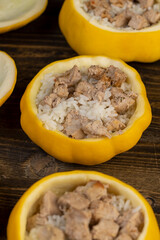 peeled and cut pumpkins on top for baking with meat and rice