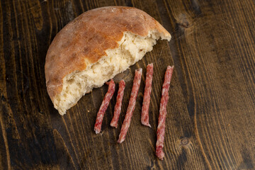 homemade wheat tortilla on the table with pieces of meat