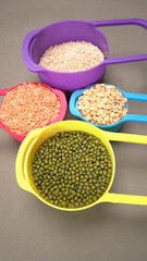 Assorted different types of beans and cereals grains. Set of indispensable sources of protein for a healthy lifestyle. Everyday use at Indian households.