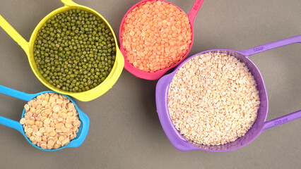 Assorted different types of beans and cereals grains. Set of indispensable sources of protein for a healthy lifestyle. Everyday use at Indian households.