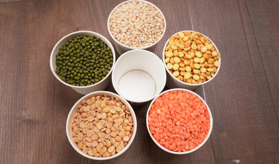 Assorted different types of beans and cereals grains. Set of indispensable sources of protein for a healthy lifestyle. Everyday use at Indian households.