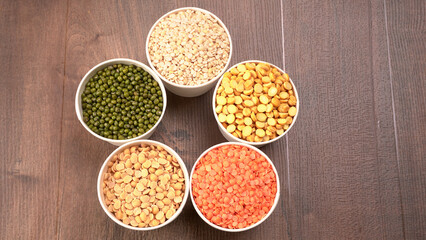 Assorted different types of beans and cereals grains. Set of indispensable sources of protein for a healthy lifestyle. Everyday use at Indian households.