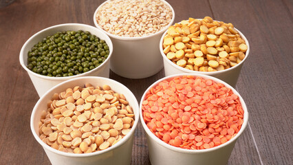 Assorted different types of beans and cereals grains. Set of indispensable sources of protein for a healthy lifestyle. Everyday use at Indian households.