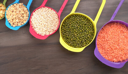 Assorted different types of beans and cereals grains. Set of indispensable sources of protein for a healthy lifestyle. Everyday use at Indian households.