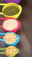 Assorted different types of beans and cereals grains. Set of indispensable sources of protein for a healthy lifestyle. Everyday use at Indian households.