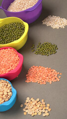 Assorted different types of beans and cereals grains. Set of indispensable sources of protein for a healthy lifestyle. Everyday use at Indian households.
