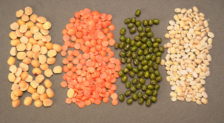 Assorted different types of beans and cereals grains. Set of indispensable sources of protein for a healthy lifestyle. Everyday use at Indian households.