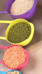 Assorted different types of beans and cereals grains. Set of indispensable sources of protein for a healthy lifestyle. Everyday use at Indian households.