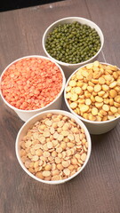 Assorted different types of beans and cereals grains. Set of indispensable sources of protein for a healthy lifestyle. Everyday use at Indian households.