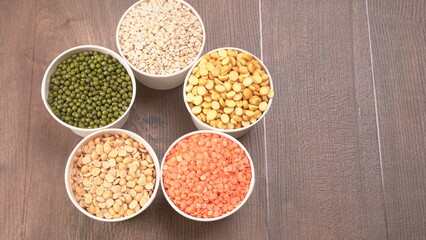 Assorted different types of beans and cereals grains. Set of indispensable sources of protein for a healthy lifestyle. Everyday use at Indian households.