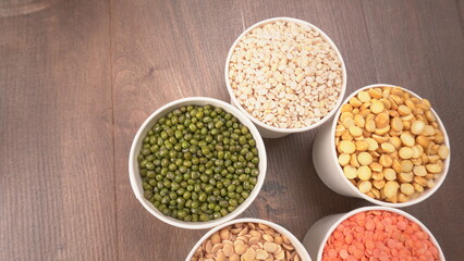 Assorted different types of beans and cereals grains. Set of indispensable sources of protein for a healthy lifestyle. Everyday use at Indian households.