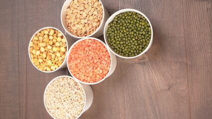 Assorted different types of beans and cereals grains. Set of indispensable sources of protein for a healthy lifestyle. Everyday use at Indian households.