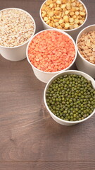 Assorted different types of beans and cereals grains. Set of indispensable sources of protein for a healthy lifestyle. Everyday use at Indian households.