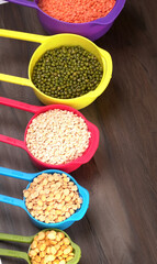 Assorted different types of beans and cereals grains. Set of indispensable sources of protein for a healthy lifestyle. Everyday use at Indian households.