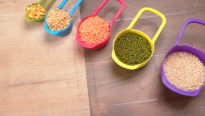 Assorted different types of beans and cereals grains. Set of indispensable sources of protein for a...