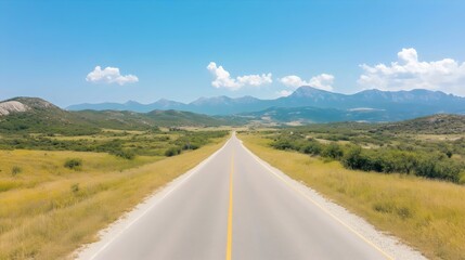 Fototapeta premium Scenic Hill Country Road Trip - Breathtaking Views and Panoramic Mountain Vistas for Adventurous Travelers Enjoying High-Altitude Drives