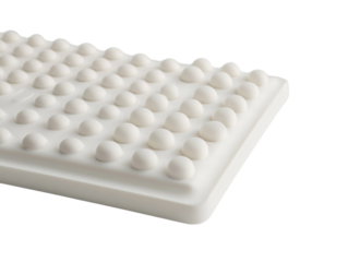 Braille keyboard with raised dots for blind users, close-up detail, isolated on white background.  PNG transparent.