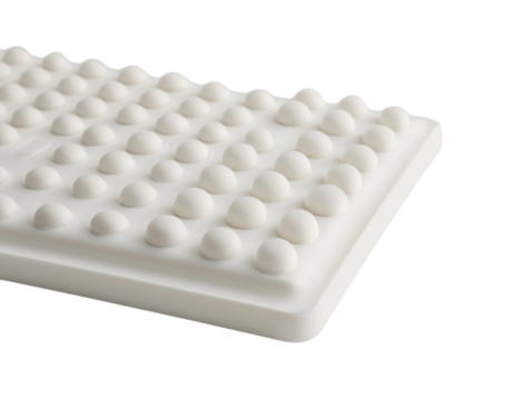 Braille keyboard with raised dots for blind users, close-up detail, isolated on white background.  PNG transparent.