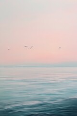 Serene ocean dawn with gentle waves and flying birds.