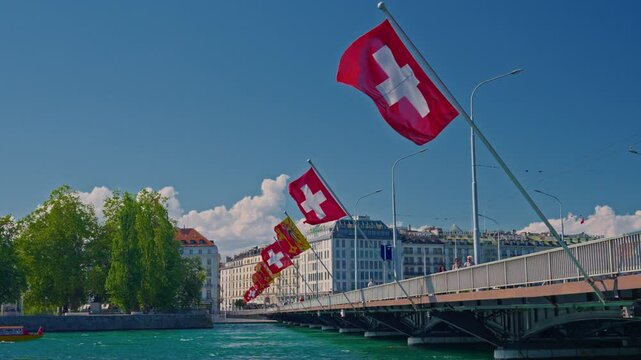 Mont Blanc bridge in Geneva with with traditional state flags. Switzerland