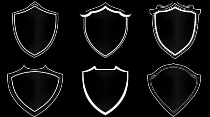 Six Black and White Shield Designs with Ornamental Borders on a Black Background