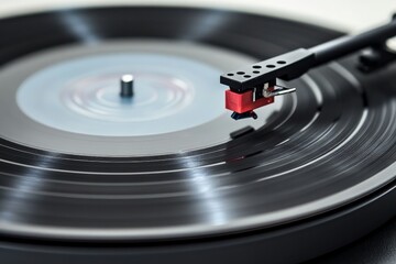 A detailed image of a turntable stylus in action, tracking over the grooves of a vinyl record, emphasizing the precision and elegance of analog music playback.