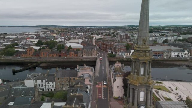 Camera flying over ayr scotland showing river ayr and buildings
