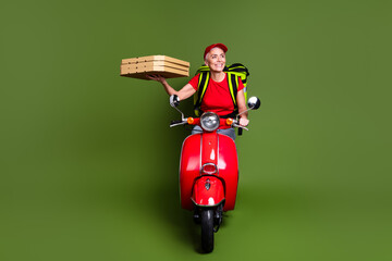 Full body photo of mature woman delivery employee thermo bag scooter pizza look empty space wear...