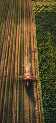 New land of vast farm and farmers harvesting crops wallpaper for web banner