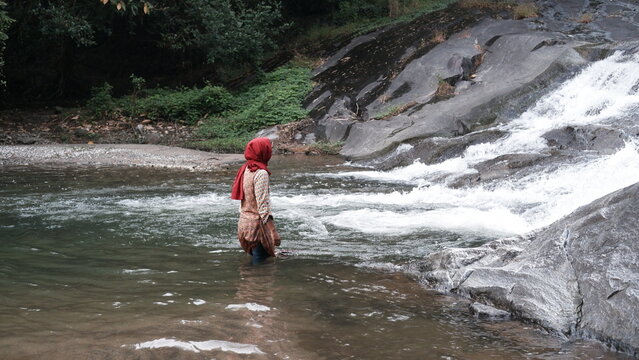 person walking in the water
