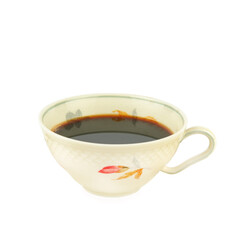 Coffee in vintage porcelain cup isolated on white.