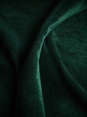 Green velvet fabric texture background.