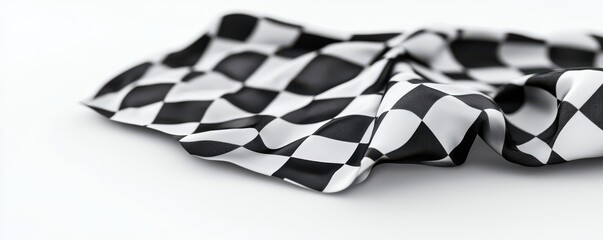 A close-up view of a wrinkled black and white checkered fabric, perfect for design and creative projects.