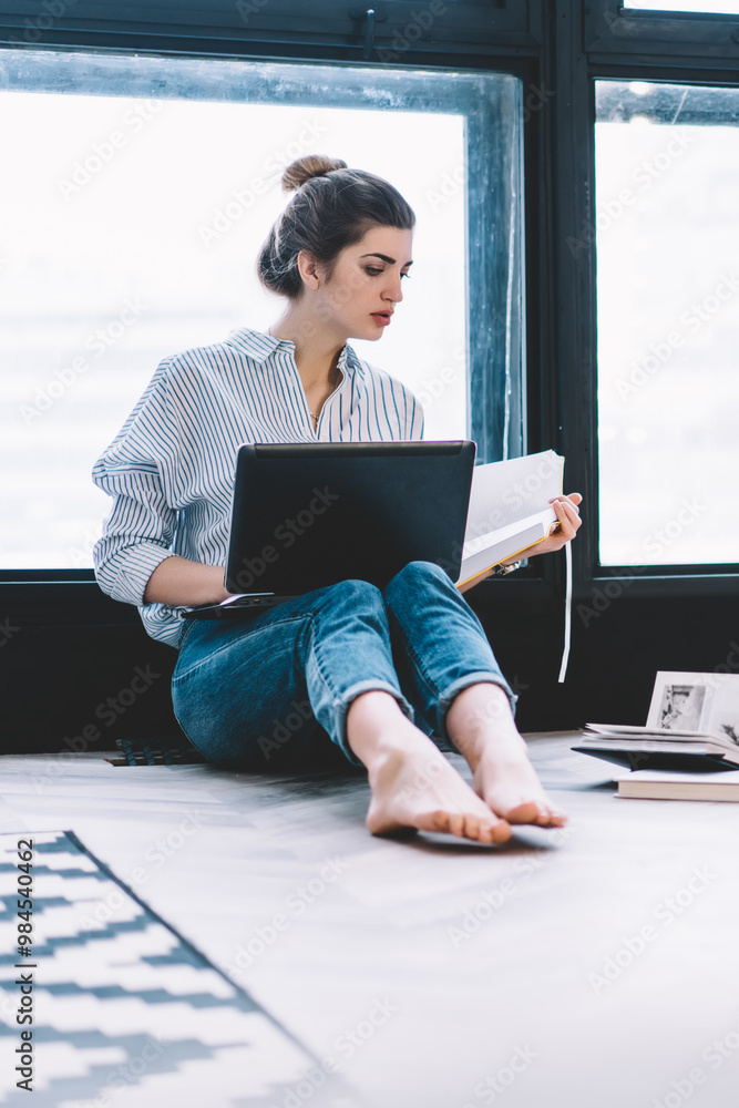 Aufkleber smart woman reading literature book while making research for project using content website with use