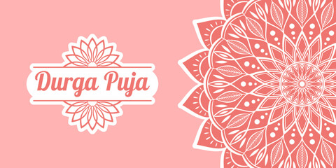 Text Durga Puja and abstract floral mandala on pastel pink background. Elegant banner design for hindu festival Durga Puja.