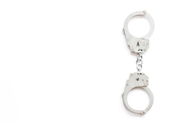 Police metal handcuffs top view. Criminal offense and detention concept