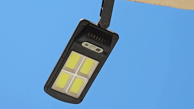 Solar street light with LED beads day white light, with solar panels, pole light with motion sensor, clean renewable energy, for usage in front of houses and parking areas of the house