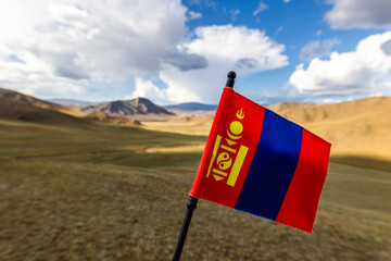 mongolian flag in vast steppe nature