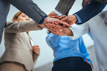 Obraz premium Teamwork Concept with Business Colleagues Joining Hands in Unity