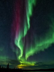 The Aurora Borealis illuminating the night sky.