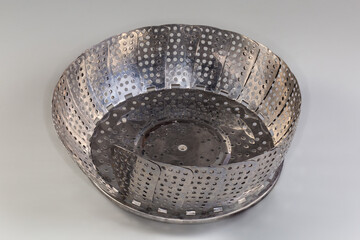 Steaming insert to the pan for steam cooking different food