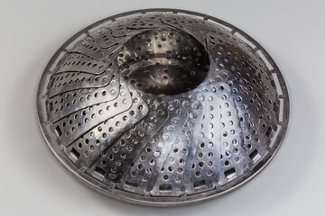 Naklejka premium Steaming insert to the pan for steam cooking different food