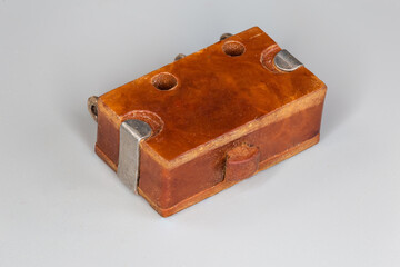 Old electrical limit switch on a gray background