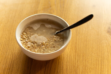 bowl of hot oatmeal on the table